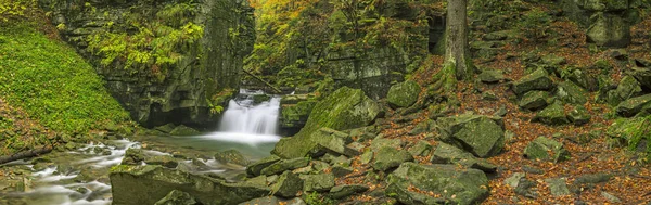 Panorama of autumn waterfalls