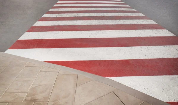 Pedestrian crossing with red and white marking