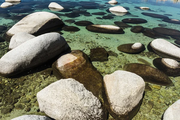 Beautiful boulders and crystal clear water of the lake Tahoe