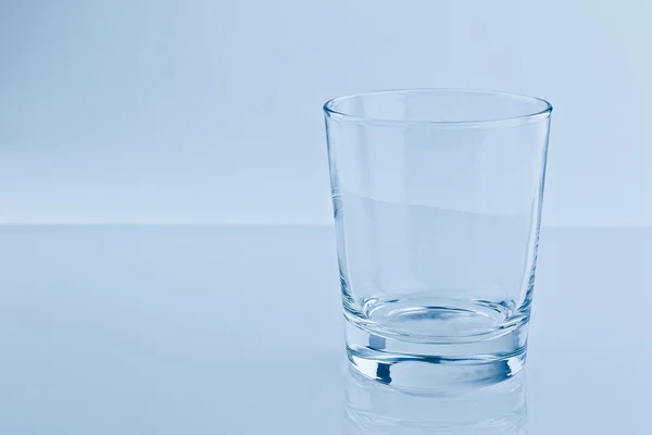 Empty water glass, nutrition and health-care concept