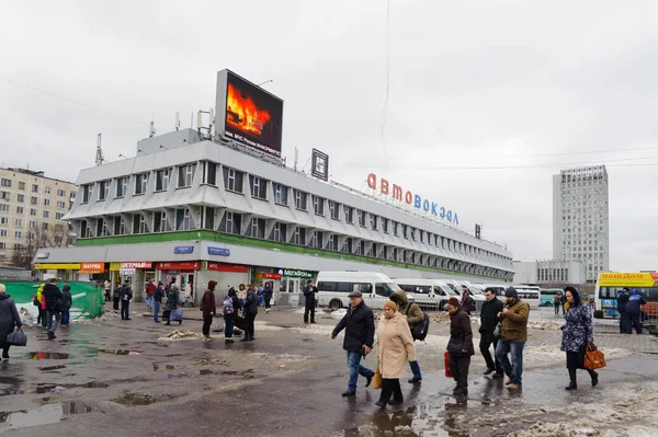 People walking past Moscow Central Bus Terminal