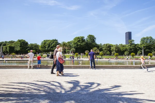 PARIS, FRANCE, on JULY 9, 2016. A picturesque corner near a pond in the Luxembourg garden, the favourite vacation spot of citizens and tourists