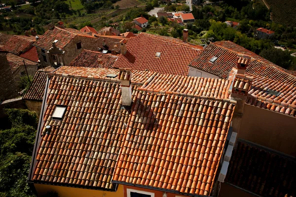 Houses with roofs covered with tiles