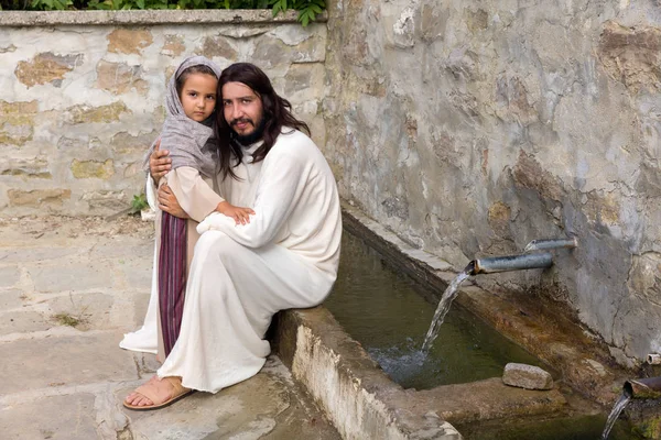 Little girl and Jesus at the water well
