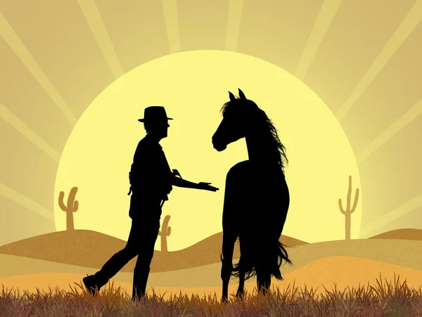 Cow boy and horse in the desert