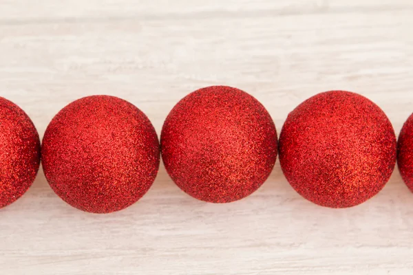 Red Christmas balls with glitter