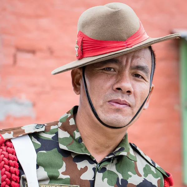 Portrait of a Gurkha warrior from the Nepalese Army in street Kathmandu, Nepal