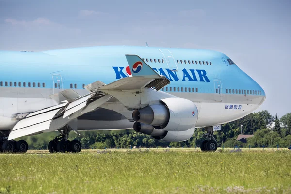 PRAGUE - July 1, 2015: Korean Air Boeing 747-400 at Vaclav Havel Airport Prague on July 1, 2015. Korean air is the flag carrier airline of South Korea.