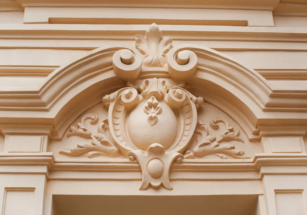 Architectural molding on the wall outside the building