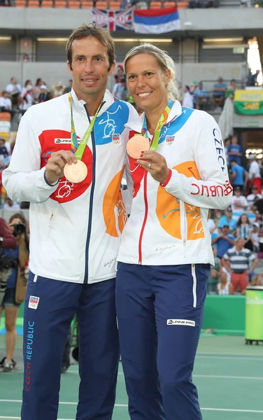 Bronze medalists Radek Stepanek (L) and Lucie Hradecka of Czech Republic during medal ceremony after tennis mixed doubles final of the Rio 2016 Olympic Games