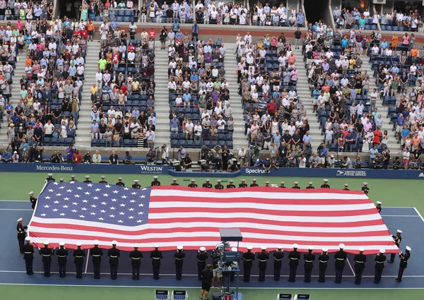 US Marine Corps unfurling American Flag during the opening ceremony of the US Open 2016 men\'s final