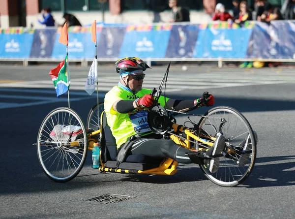 New York City Marathon wheelchair division participants traverse 26.2 miles through all five NYC boroughs to the finish line in Central Park, Manhattan