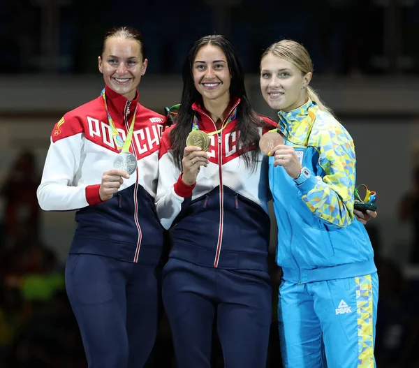 Women\'s Sabre Individual winners at Rio 2016 Olympic Games Sofya Velikaya of Russia (L),Yana Egorian of Russia and Olga Kharlan of Ukraine during medal ceremony