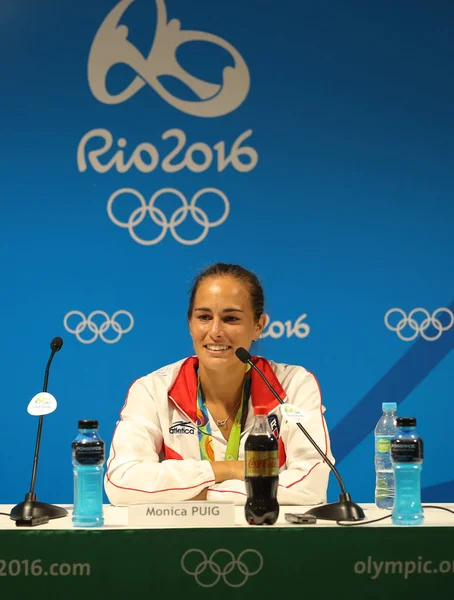 Olympic champion Monica Puig of Puerto Rico during press conference after victory at tennis women\'s singles final of the Rio 2016 Olympic Games