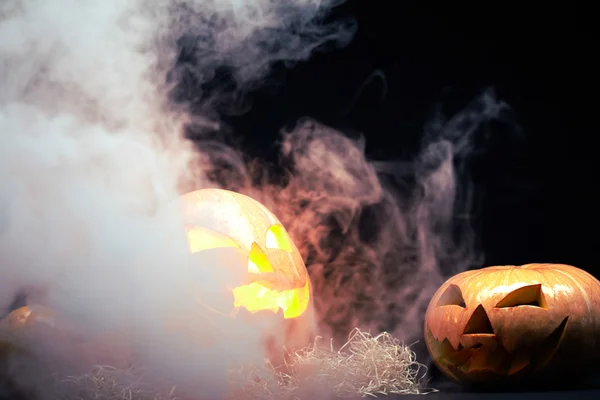 Halloween pumpkin burning and smoking