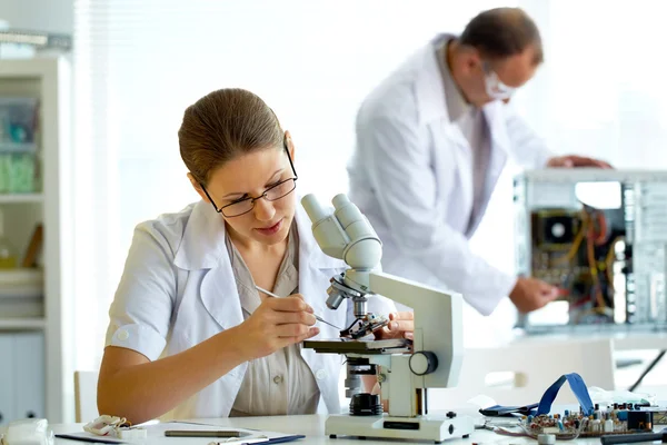 Professional scientists working at the laboratory