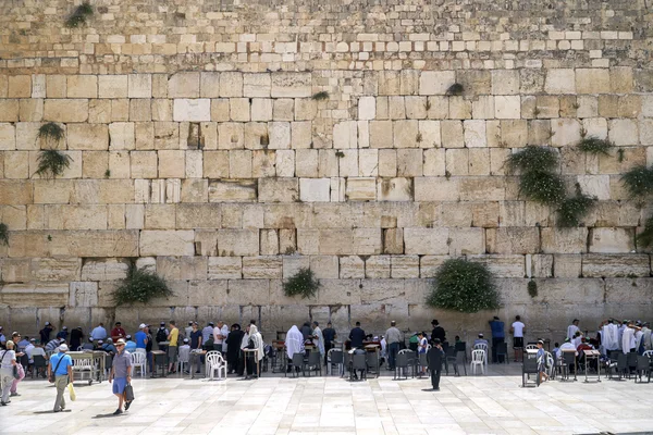 Jews praying in front of the Wailing Wall in Israel