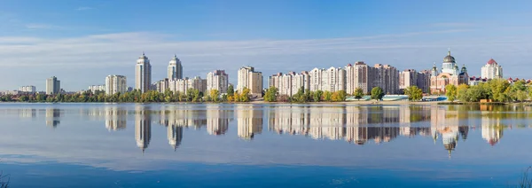 Panorama of modern apartment complex on the river banks