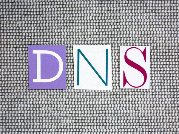 DNS (Domain Name System) acronym on grey background