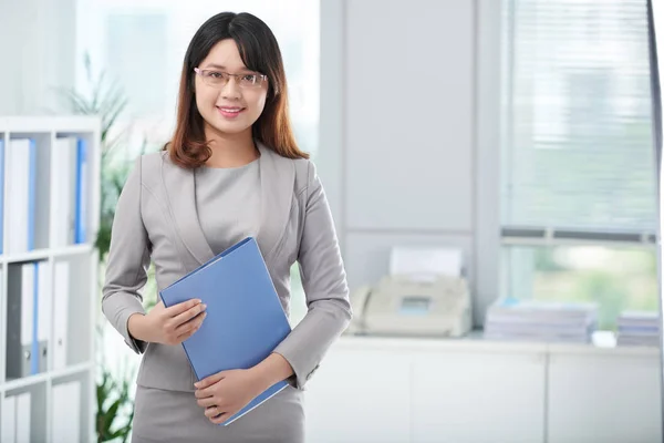 Financial manager with folder of documents