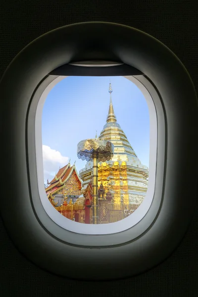 The window of airplane with travel destination attraction. Chian