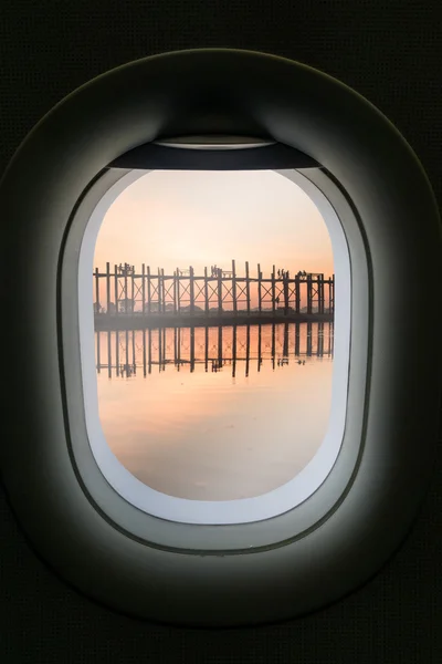 The window of airplane with travel destination attraction. Myanm