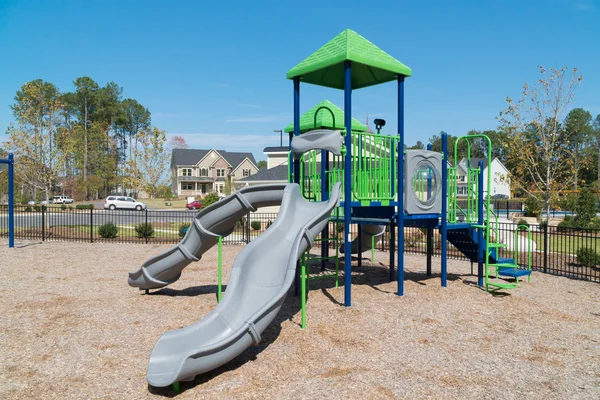 Playground equipment in a play area