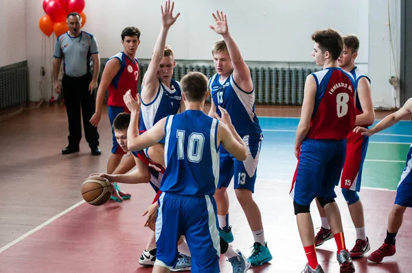 Orenburg, Russia - 15 May 2015: Boys play basketball