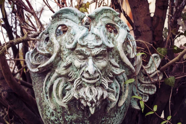 Satyr Woodland god face sculpture