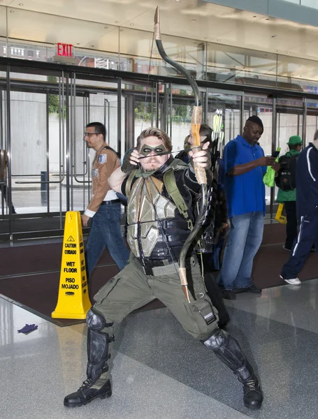 Man wearing Green Arrow costume at NY Comic Con