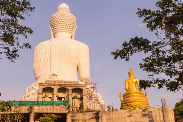 Back view of Phuket Big Buddha Statue while surrounding area under construction