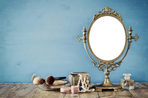 oval mirror and  fashion objects