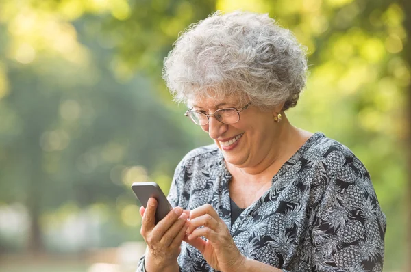 Senior woman using smartphone