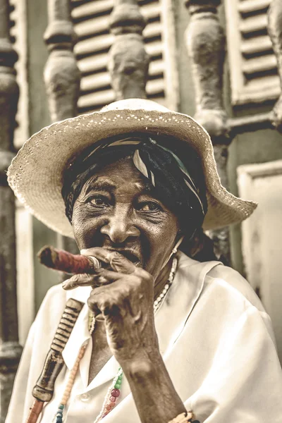 Cuban woman smoking cigar