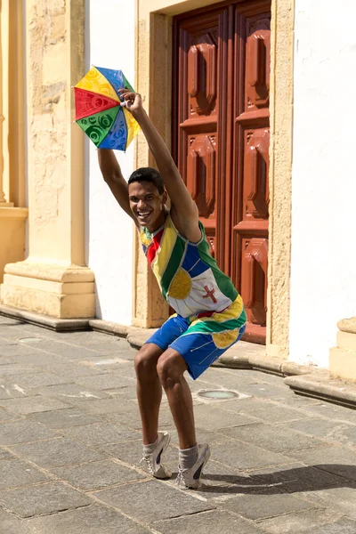 Young Brazilian man dancing Frevo