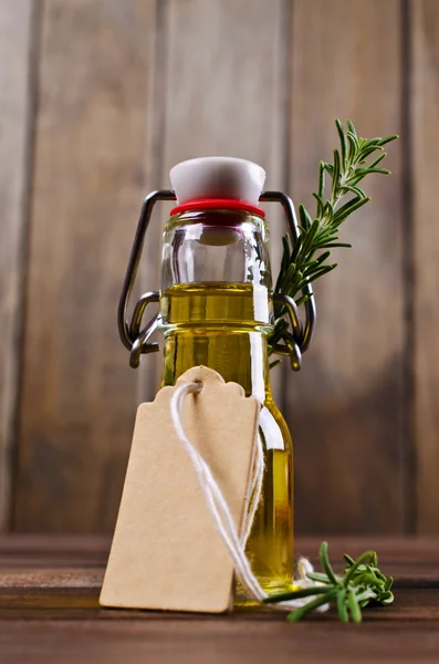 Oil with dry leaves of rosemary