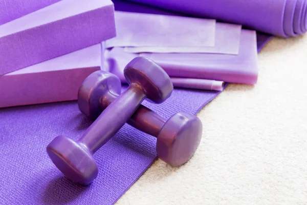 Fitness yoga pilates equipment props on carpet