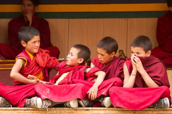 Restless boys monks  at the Cham Dance Festiva in Lamayuru