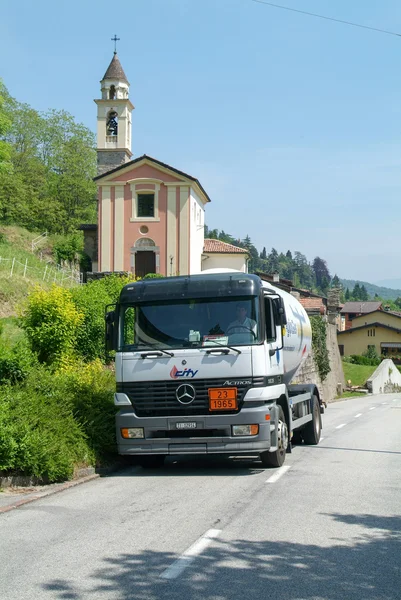 Gas truck on the road at Malcantone valley