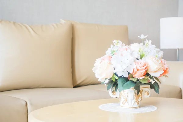 Flower vase on table decoration in living room area interior