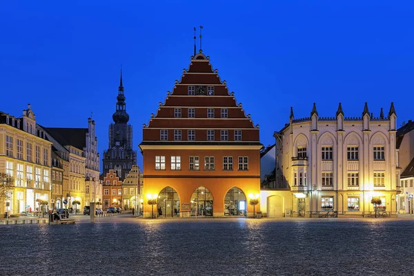 Evening view of Market square with Town Hall in Greifswald, Germany