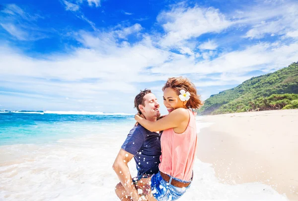 Young couple at tropic beach