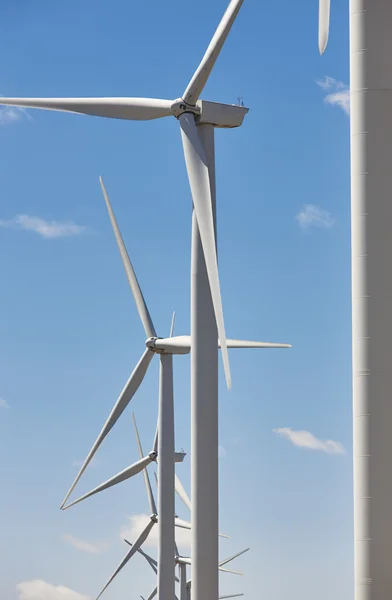 Wind turbines and blue sky. Clean alternative renewable energy.