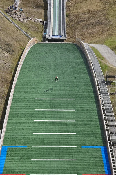 Ski jump. Artificial track. Sport background. Norwegian summer.