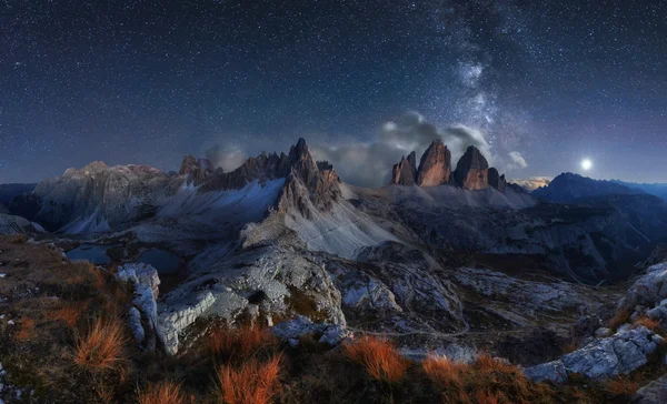 Alps Mountain landscape with night sky and Mliky way, Tre Cime d