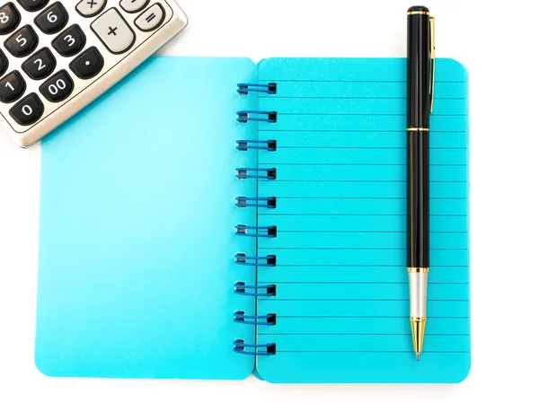 Pen and blue notebook and calculator on white background