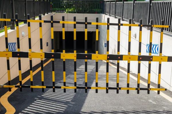 Vehicle security barrier closed - entrance to an underground car park