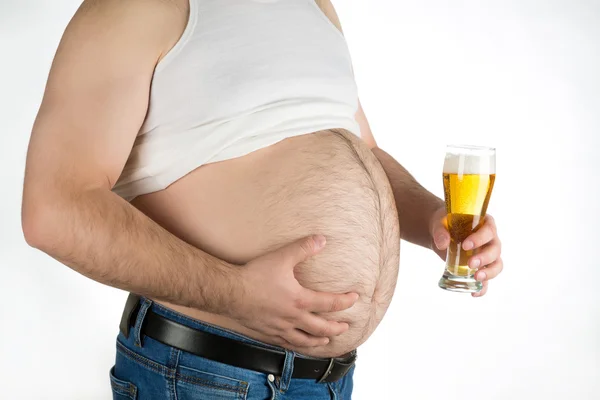 Closeup fat belly with beer isolated on white background