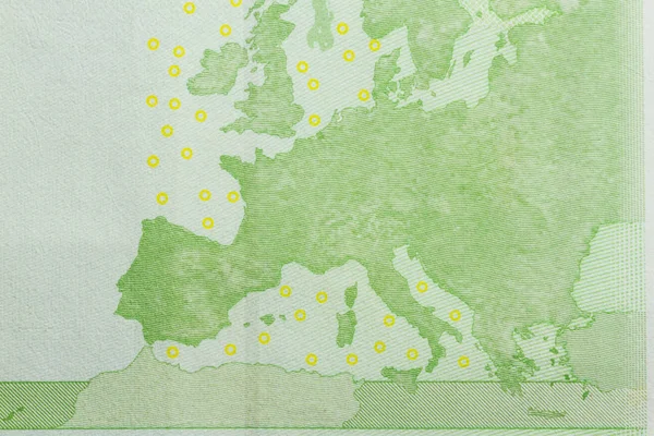 Europe continent on euro banknote close up