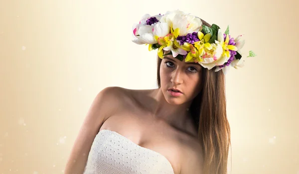 Model woman with crown of flowers